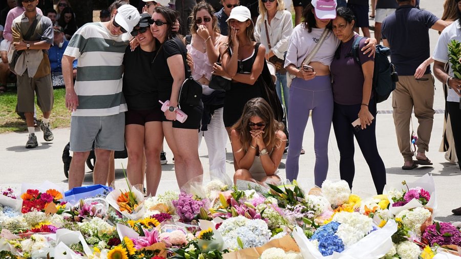   Hundreds gather to lay flowers at the site of the deadly Bondi Beach shooting -   NO COMMENT    
