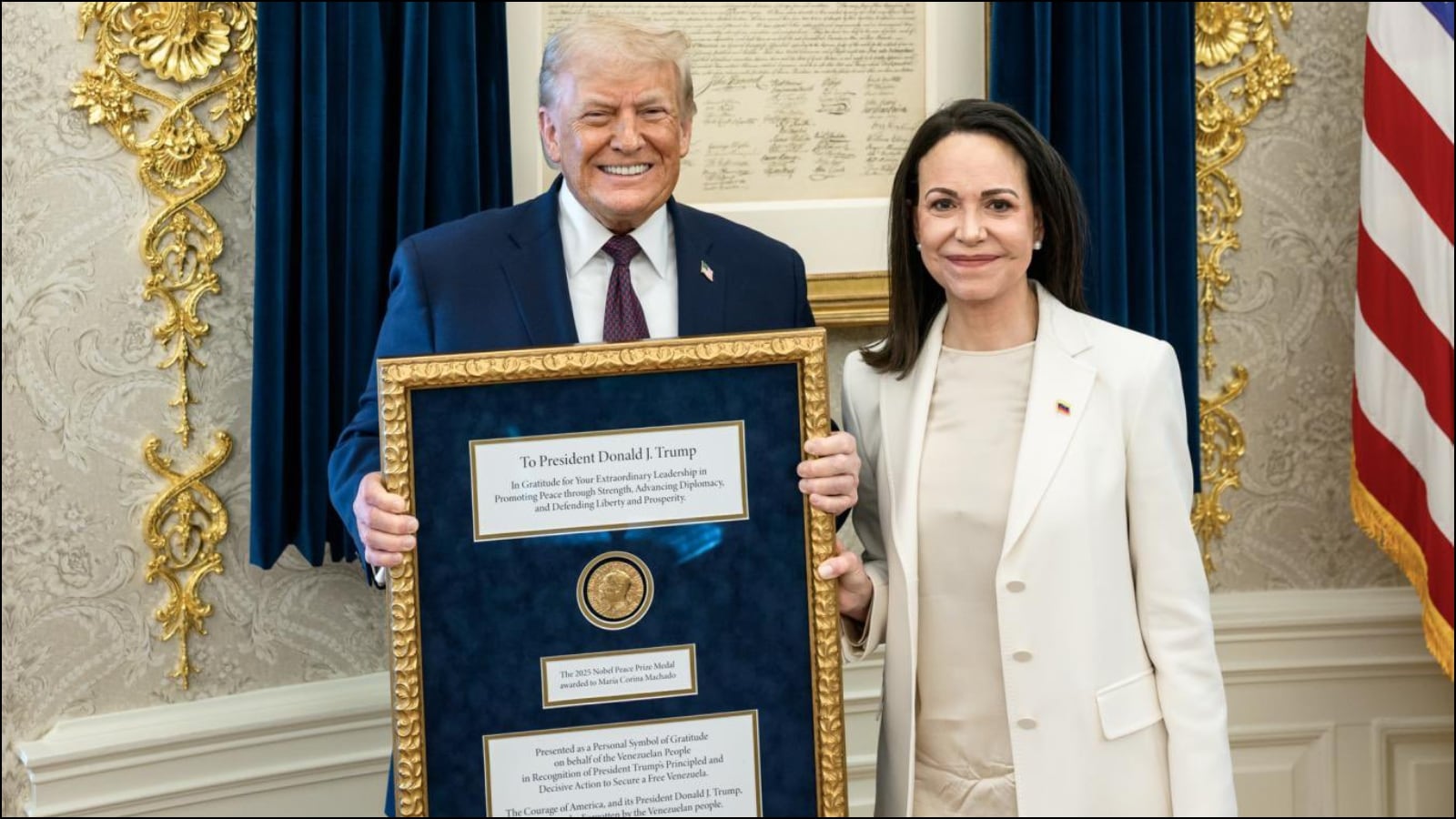 Venezuelan Nobel Peace Prize winner presents her medal to Trump