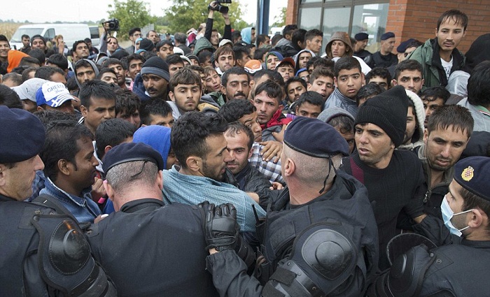 Estonian Police Fire Rubber Bullets at Refugees in Migrant Center