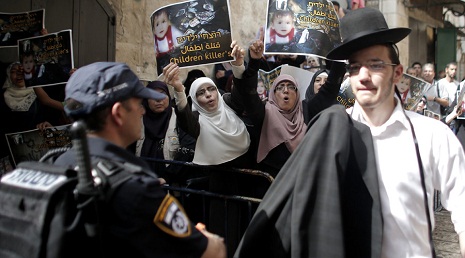 Palestinian youths clash with police at Al-Aqsa mosque in Jerusalem