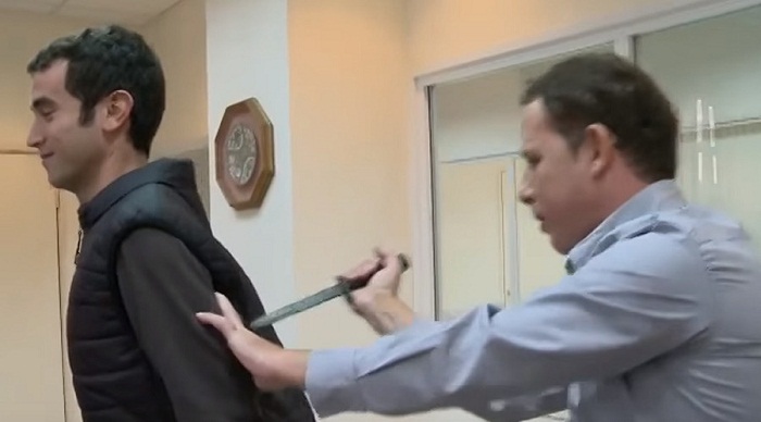 Israeli TV reporter stabbed demonstrating `knife-proof` vest