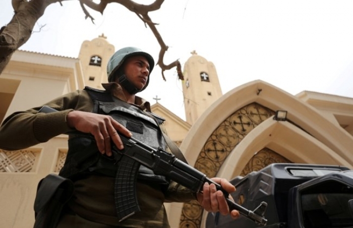 Gunman attacks church near Cairo, shot dead: police