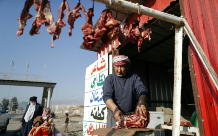 Irak: sur le marché de Gogjali, cigarettes et produits iraniens