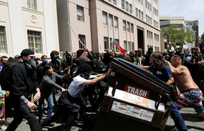 14 arrested in Berkeley, California as fights break out between Trump supporters and opponents