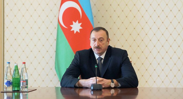 Prezident laoslu həmkarını təbrik etdi