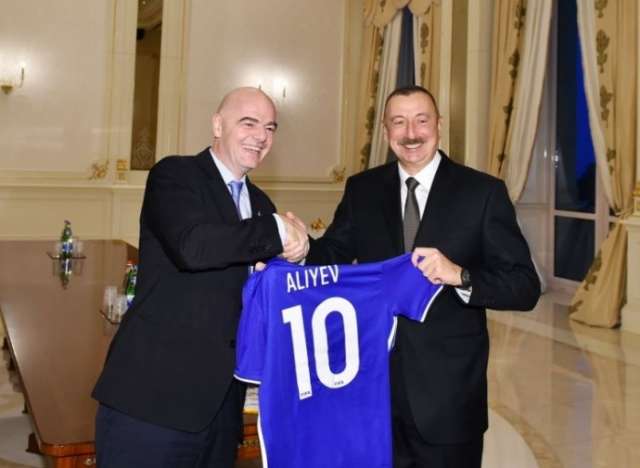Ilham Aliyev receives FIFA president and secretary general
