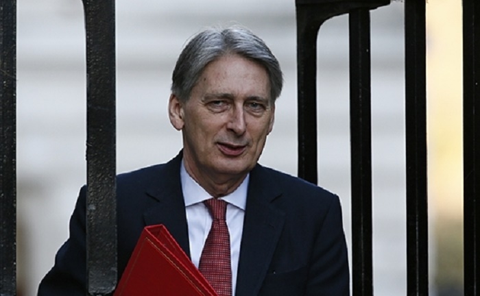 Britain says uneasy after evidence of Kurdish coordination with Syria and Russia