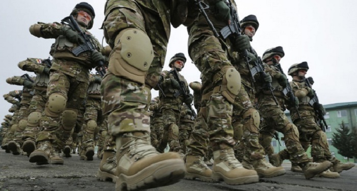 Turkey`s President warns NATO on sheltering `terrorist` plotters