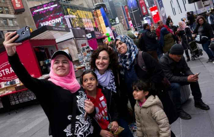 Des réfugiés syriens et irakiens, touristes d'un jour à New York