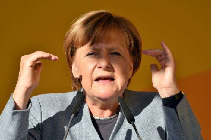Dégage!: Angela Merkel, cible de "citoyens en colère"