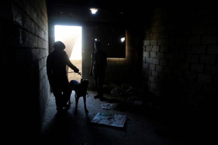 Syrie: l'EI encerclé et piégé dans son fief de Raqa