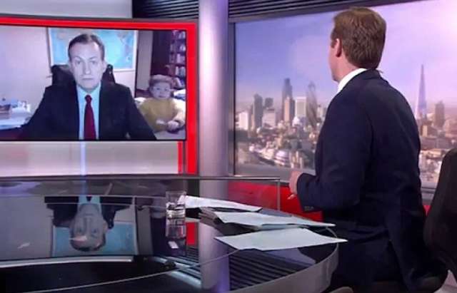Brilliant moment a BBC expert's live interview is gatecrashed -VIDEO