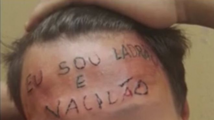 Brazil teen branded 'I'm a thief' over bike theft accusations