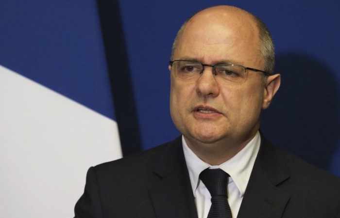 French interior minister resigns after reports he hired his daughters