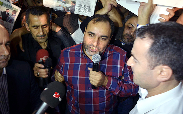 Turkish newspaper editor arrested over tweets "insulting"