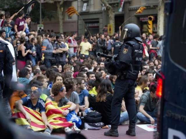 Tens of thousands hit Barcelona streets to protest separatist crackdown