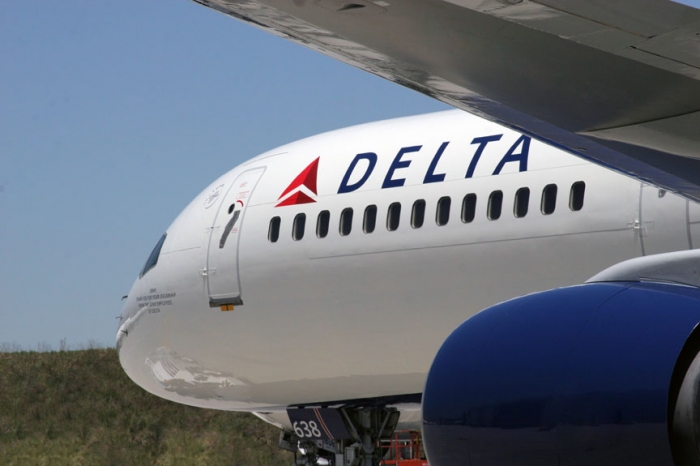 Three injured on US airplane after passenger tries to enter cockpit
