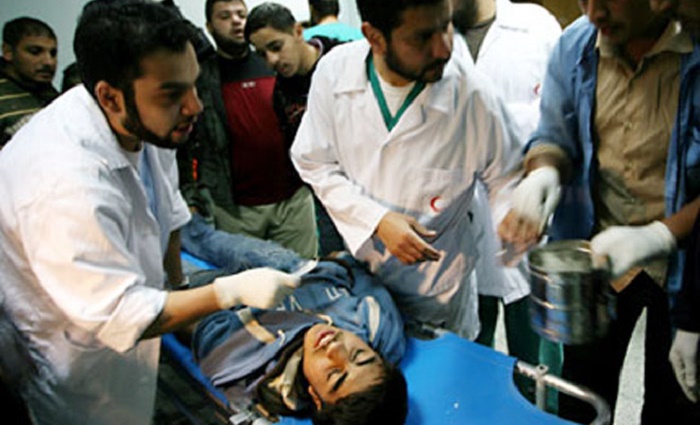Twin explosions in Homs, Syria kill 26, wounds 100