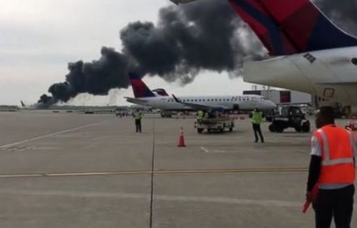 20 injured after American Airlines plane catches fire at Chicago`s O`Hare Airport