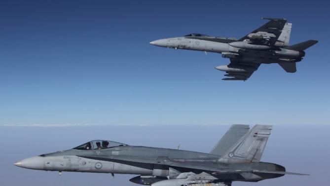 Australian warplanes make first air strike in Syria