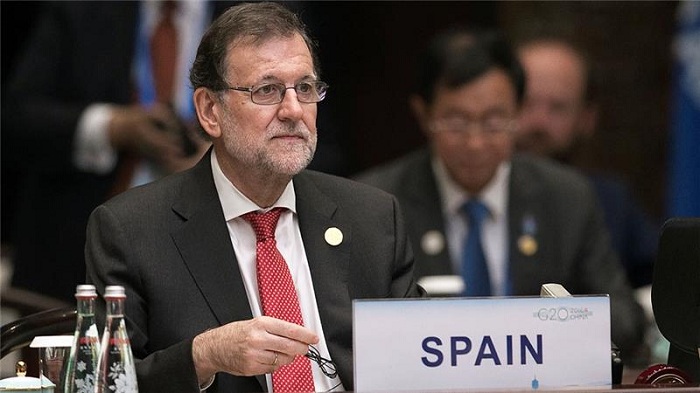 Spain`s Socialists lift veto on minority government