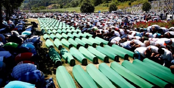 Srebrenica buries 127 victims of massacre, Serbs absent over genocide denial