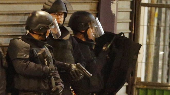 Paris attacks: Police swoop on apartment in northern suburb