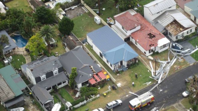 Tornado rips roofs off homes as record winds lash Sydney