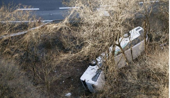 Japan mountain bus crash kills 14 and injures 27