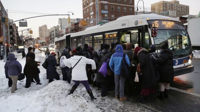 US blizzard: Millions battle snow travel chaos