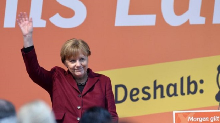 Merkel faces test as Germany votes in regional elections