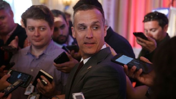 US election: Donald Trump aide charged with assault