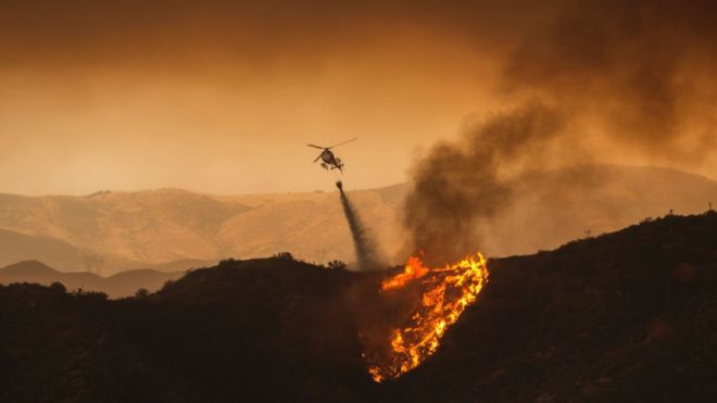 California wildfires: Hundreds flee homes near Los Angeles