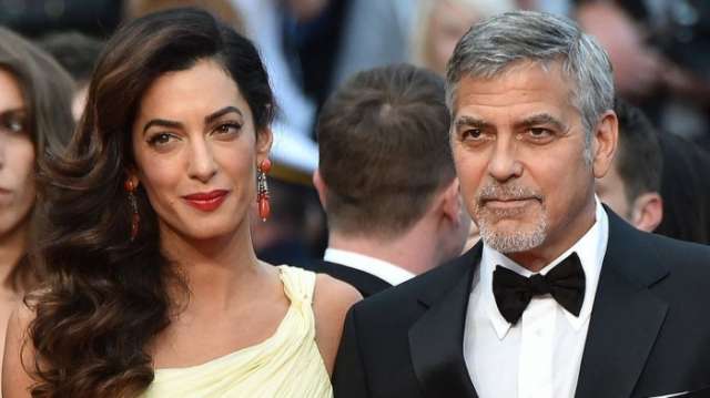 George Clooney 'to sue' French magazine for twins' photos