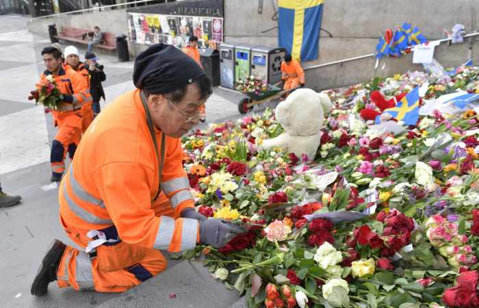Stockholm takes first steps back to normal after truck attack