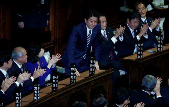 Japan's Abe re-elected prime minister after big election win