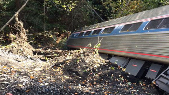 Dutch passenger train derails after hitting maintenance crane