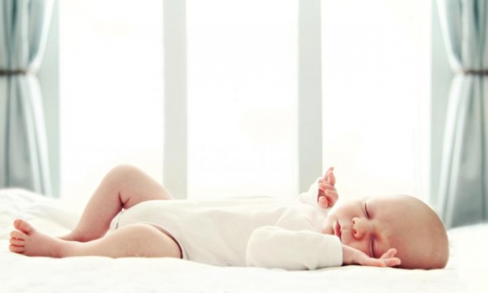 When should babies start sleeping in their own room?