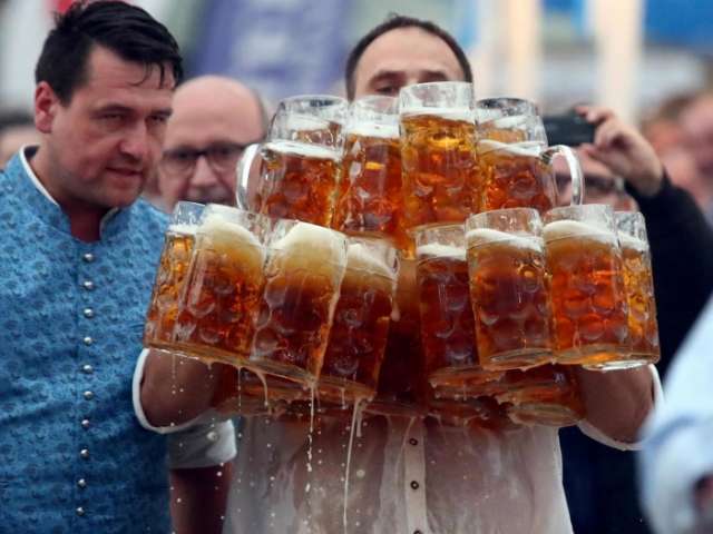 German tax inspector breaks world record for carrying beer