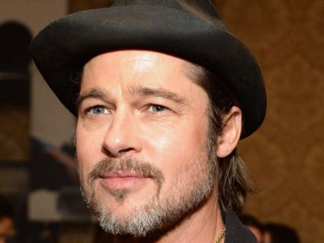 Brad Pitt assures fans he is coping with divorce from Angelina Jolie, joking: 'I'm not suicidal'