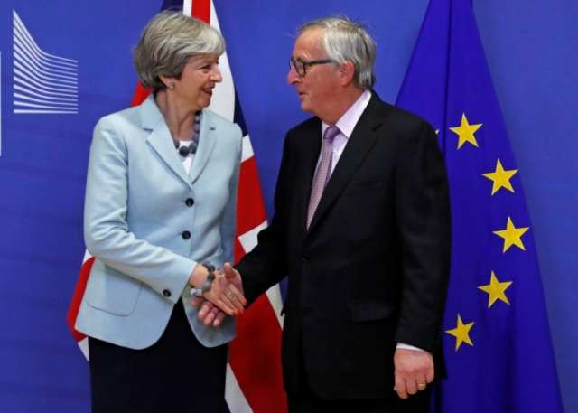 Britain and EU clinch deal to move Brexit talks forward
