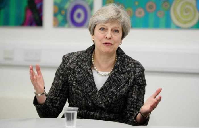 British PM May refuses to rule out personal tax hikes after election