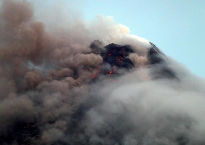 Philippine province declares 'calamity' as volcano lava spreads