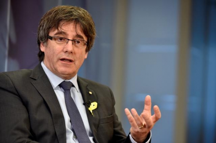 Catalonia's Puigdemont seeks to vote by proxy for comeback bid: source