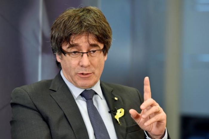 Let me come back, Catalan leader tells Spain