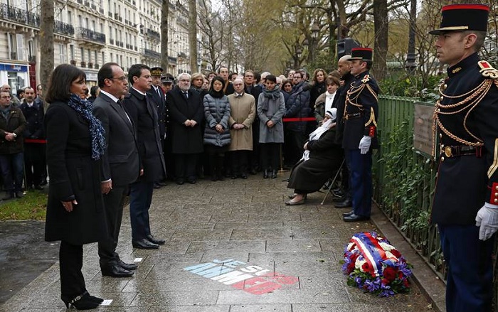 French President unveils plaque in Paris