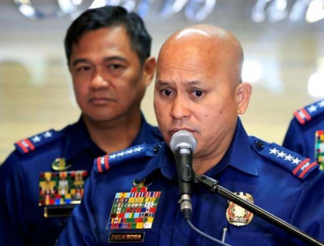 Philippine top cop says police try to save lives of drugs war victims