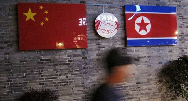 China bans new and expanded North Korea businesses