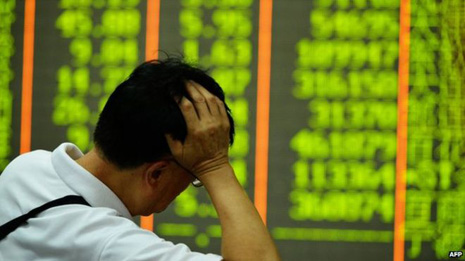 Chinese shares slide in another day of volatile trade