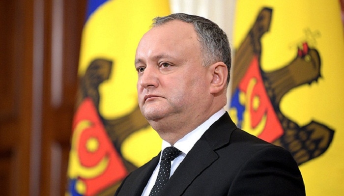 Moldova government expels five Russian diplomats, president furious